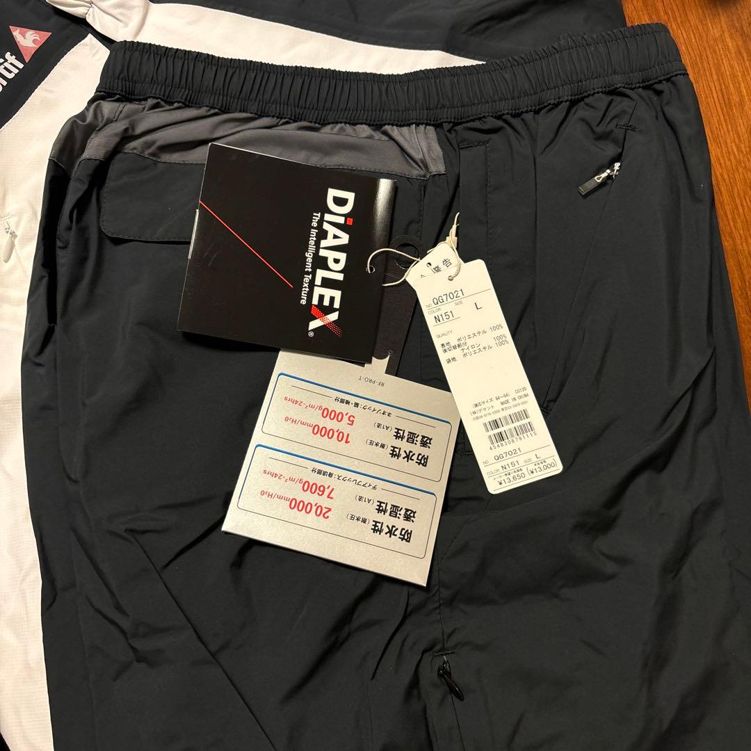 SALE 新品タグ付 ルコックゴルフ上下セット レインウェアL　　袋付 黒白