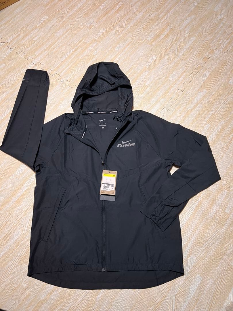 Nike ウィンドブレーカー L 新品