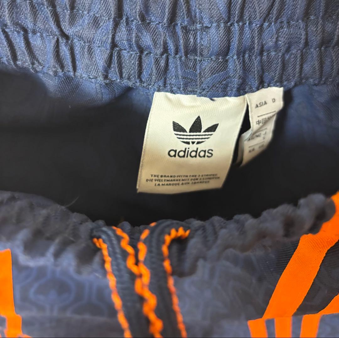 adidas originals トラックパンツ ネイビー×オレンジ 総柄 S