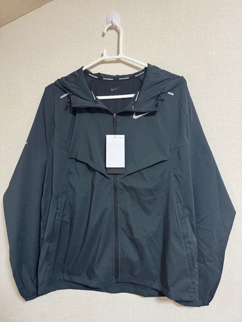 Nike ウィンドブレーカー ライトブルー